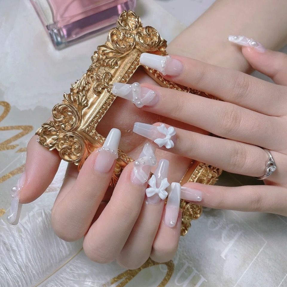 Designer: DuoDuo 3005.Handmade nails Press on Nails DIY Nail Art for woman girl French Long Coffin white wedding