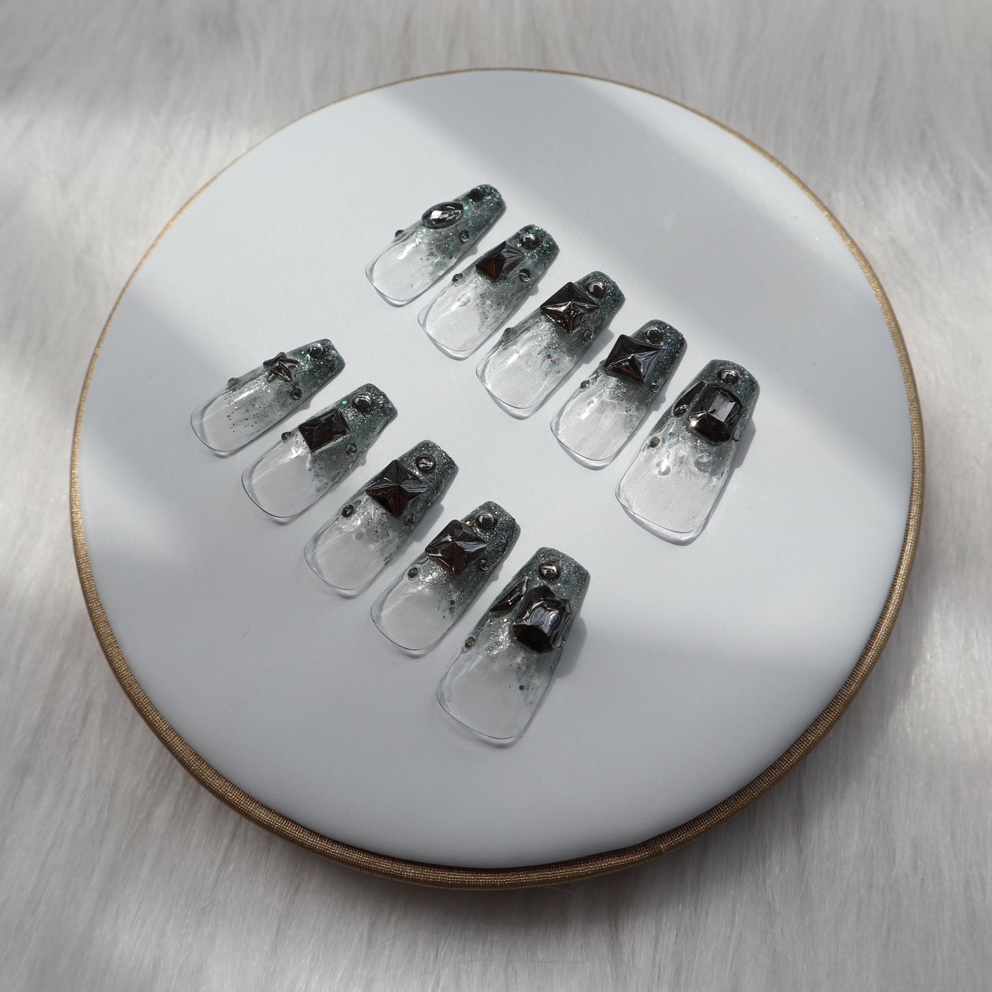 Designer: XinXin 22. Cool rivet transparent handmade nails Press on Nails DIY Nail Art