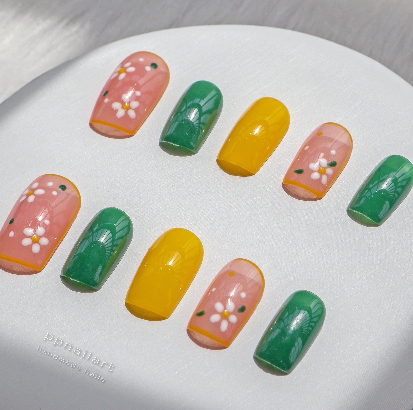 Designer: XinXin 4.Colourful flowers short square handmade nails