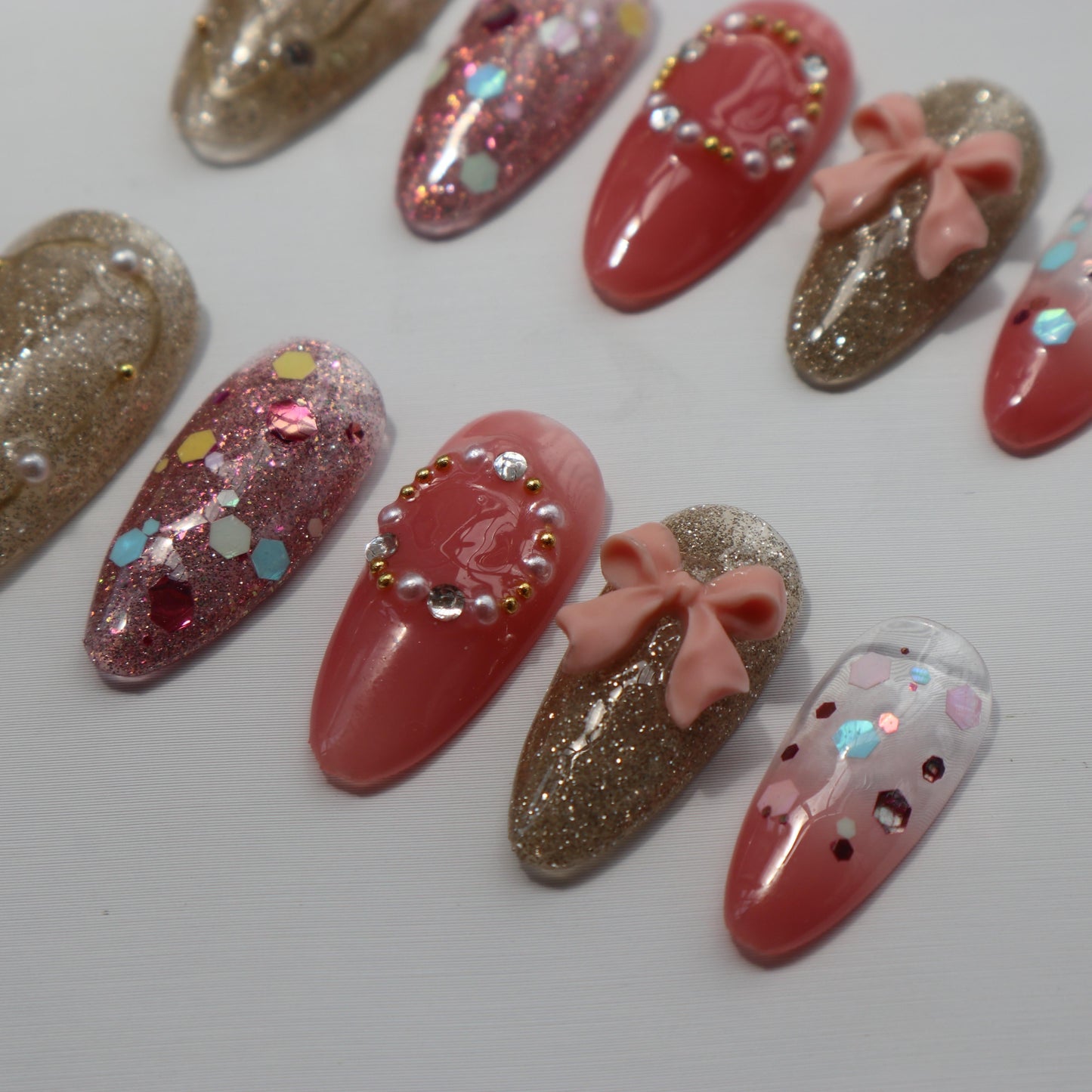 Designer: XinXin 39.Pink golden bow-knot shining handmade nails Press on Nails DIY Nail Art